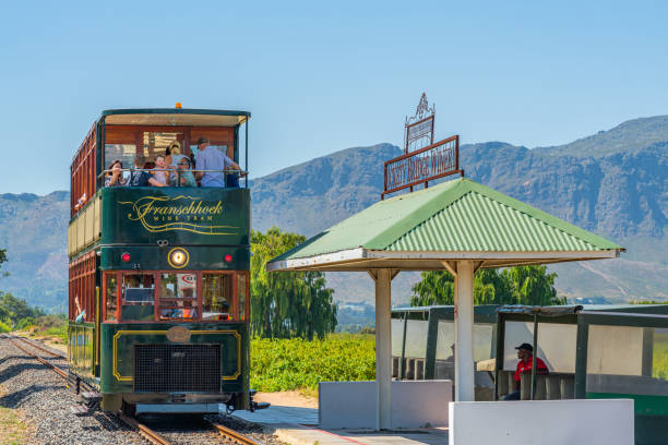 FRANSCHHOEK WESTERN CAPE SOUTH AFRICA - FEBRUARY, 02. 2020 - Rickety Bridge Winery Railway Station for Tourist Tram ride between Vineyards in the Franschhoek Valley Southern Africa