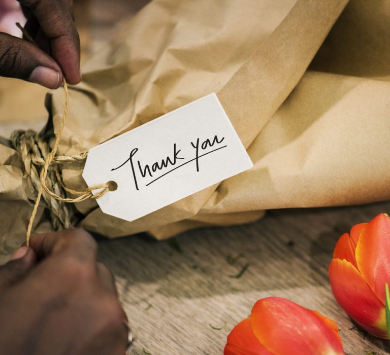 Closeup of thank you flower bouquet Closeup of thank you tag on a flower bouquet